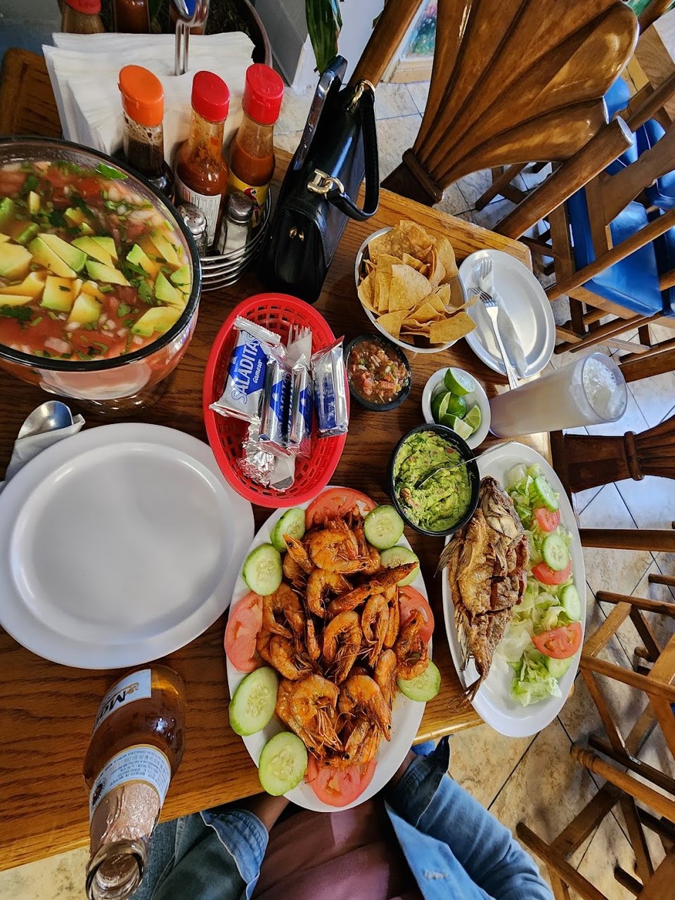 Assorted dishes shown beside a seafood menu.