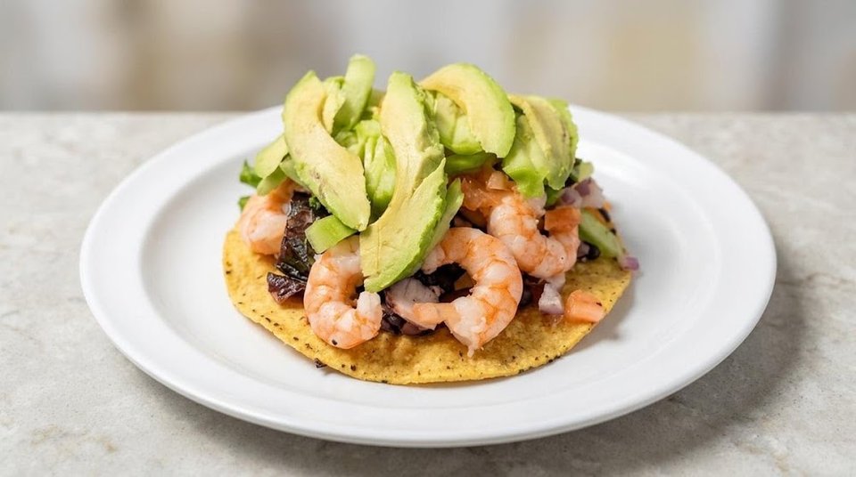Printed menu with seafood, tacos, and burritos.