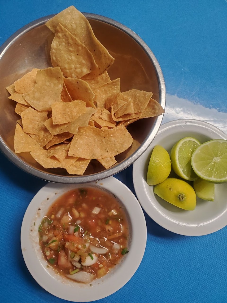 Printed menu with seafood, tacos, and burritos.